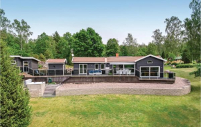 Four-Bedroom Holiday Home in Boxholm, Blåvik